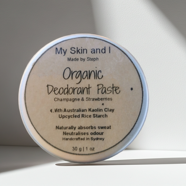 Organic deodorant paste container with label on a neutral background